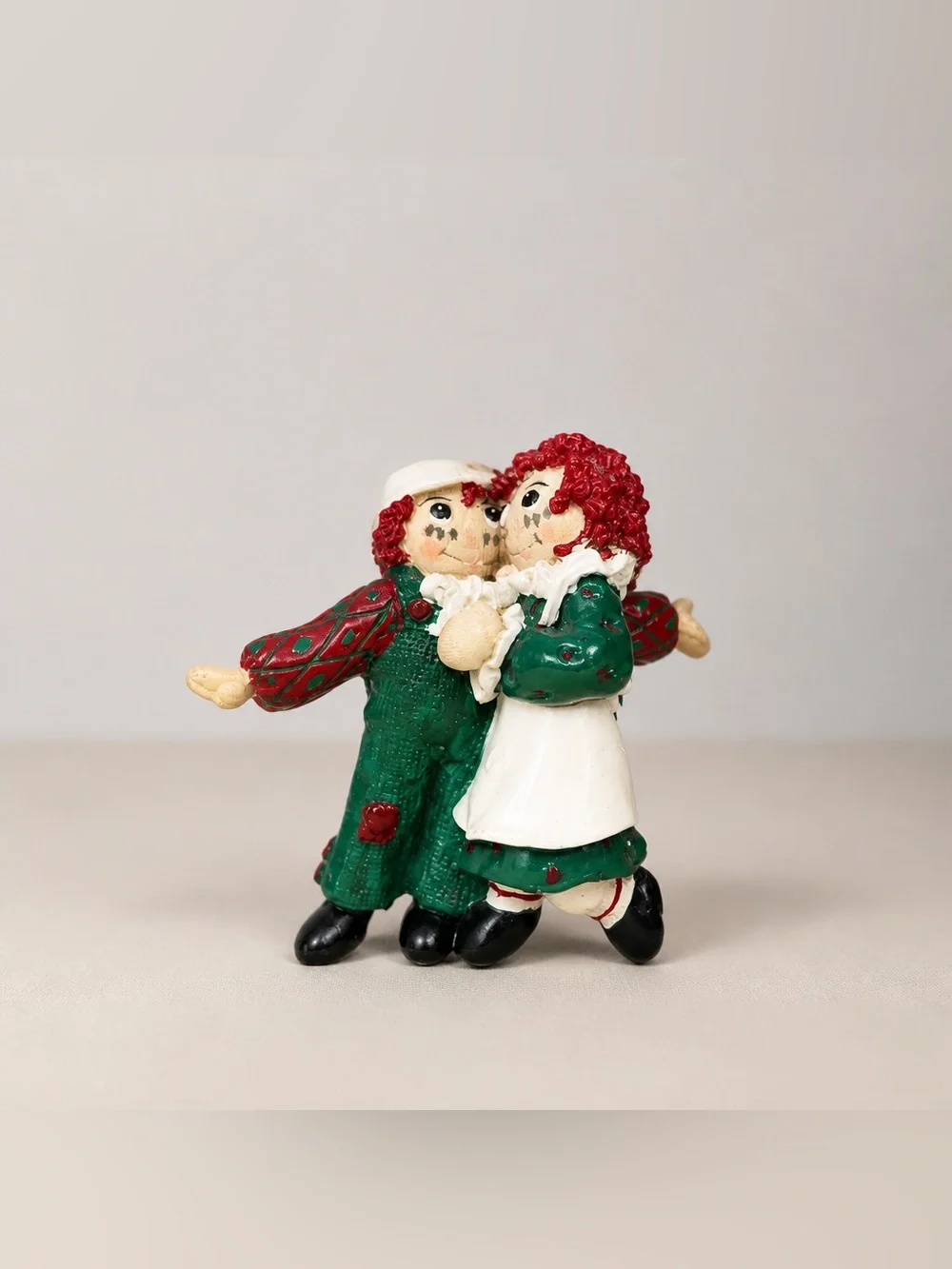 Raggedy Ann & Andy dancing Vintage Christmas ornament.